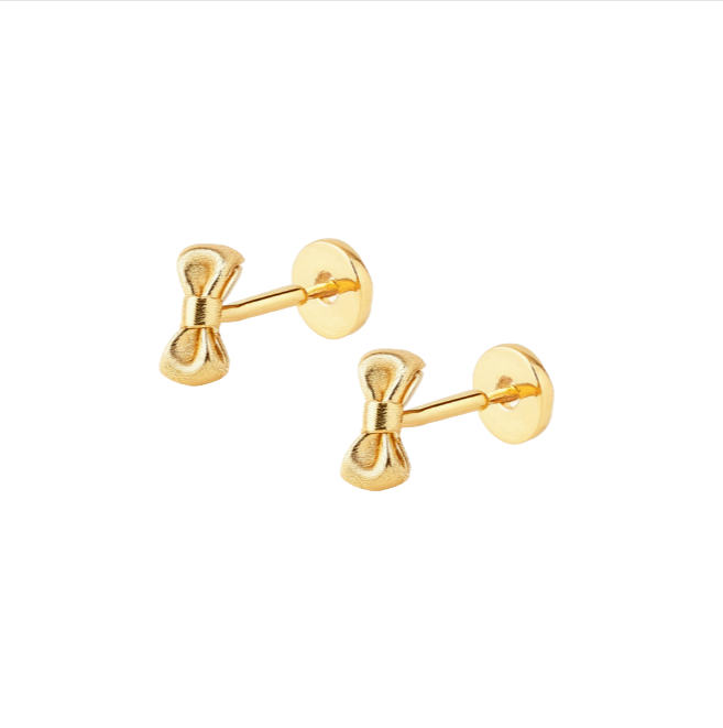 A pair of 14k gold, flatback earrings in a bow tie shape.