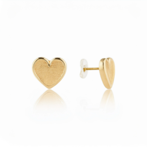 A pair of 14k gold heart shaped flat back earrings, designed for comfortable wear in helix and lobe piercings.