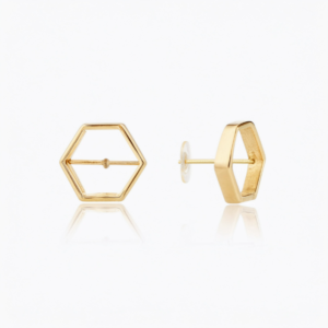 A pair of 14k gold hexagonal flat back earrings, featuring a minimalist geometric design ideal for helix and cartilage piercings.