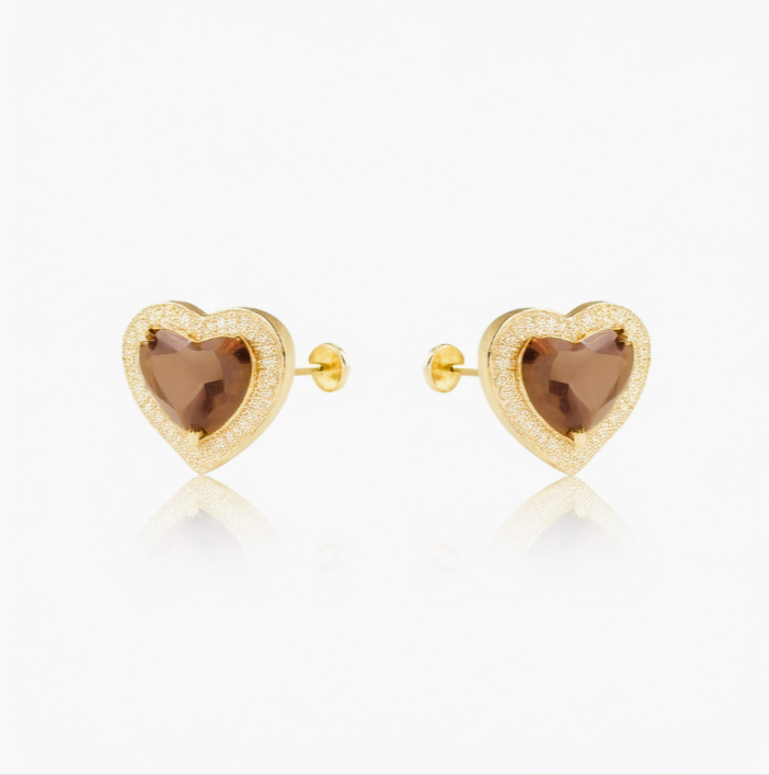 A pair of gold plated flat back earrings featuring heart-shaped smoky quartz crystals, ideal for helix and cartilage piercings.